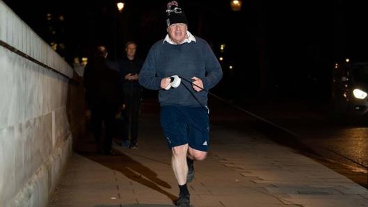 Prime Minister Boris Johnson jogging in central London. The Prime Minister is set to face further questions over a police investigation into partygate as No 10 braces for the submission of Sue Gray&#39;s report into possible lockdown breaches. Picture date: Wednesday January 26, 2022.