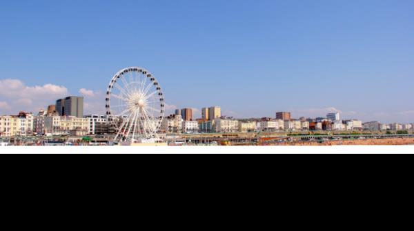 Panoramic view of Brighton Beach. Brighton wheel and hotels. Crowded with people on sunny day. xxEnglandCoastPath England Coast Path ShorehamÃÂ to Eastbourne ; text byÃÂ RobÃÂ McFarlandcr:ÃÂ iStockÃÂ (reuseÃÂ permitted, noÃÂ syndication)ÃÂ 

